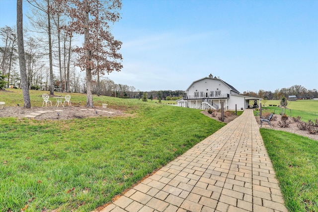 view of yard featuring a wooden deck