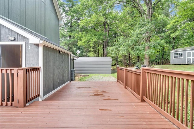 deck featuring an outbuilding and a storage shed