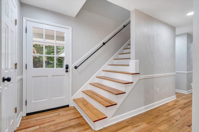 interior space featuring stairway, recessed lighting, light wood-style flooring, and baseboards