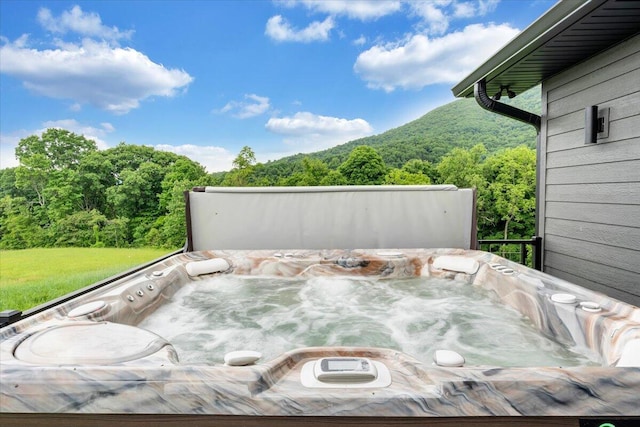 view of patio / terrace featuring a hot tub