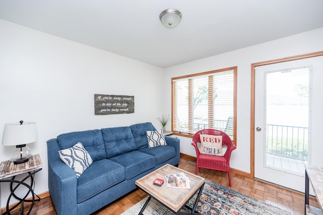 living room with parquet flooring