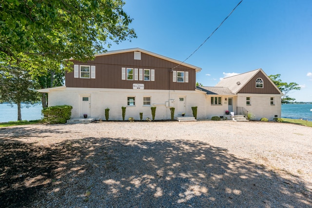 view of front of home featuring a water view