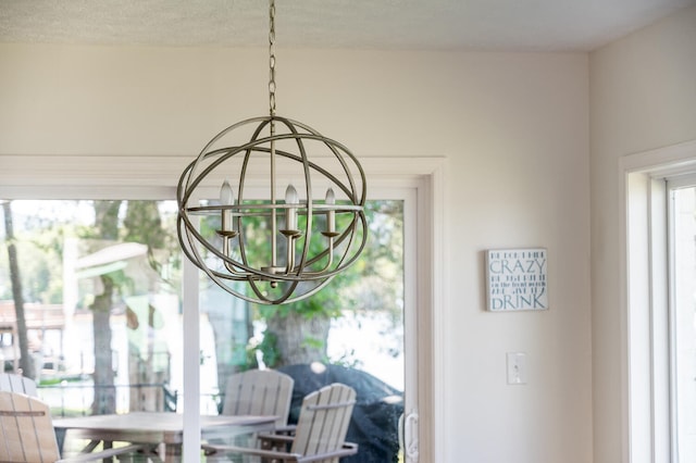 details featuring an inviting chandelier