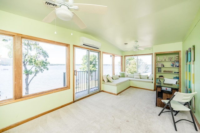 sunroom / solarium with ceiling fan, lofted ceiling, and a wall mounted air conditioner