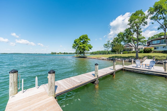 view of dock with a water view