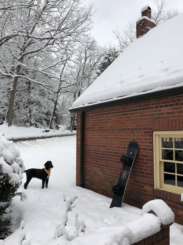 view of snow covered property