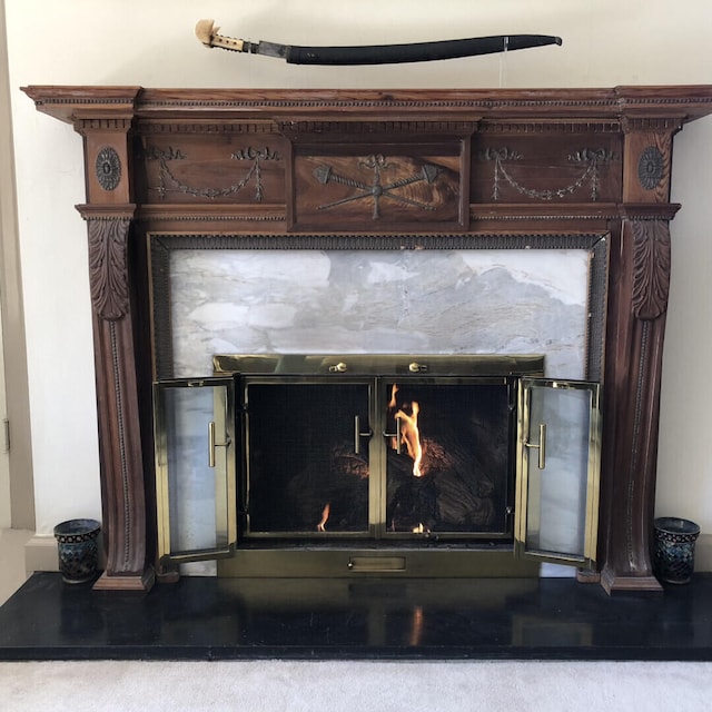 interior details featuring a fireplace