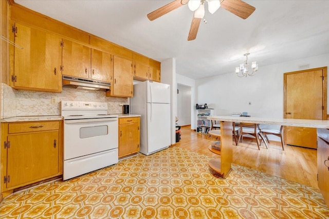 kitchen with ceiling fan with notable chandelier, backsplash, and white appliances