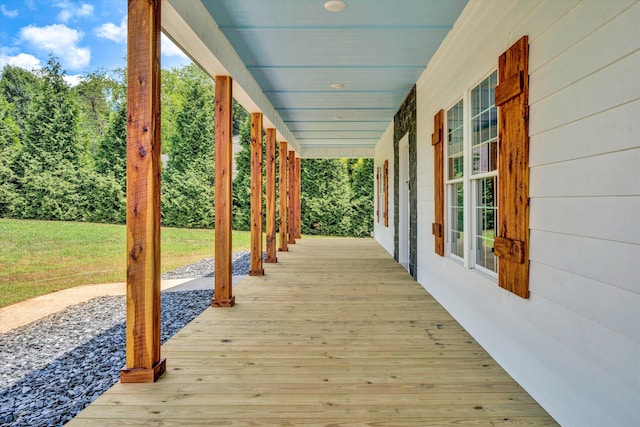 wooden terrace with a porch