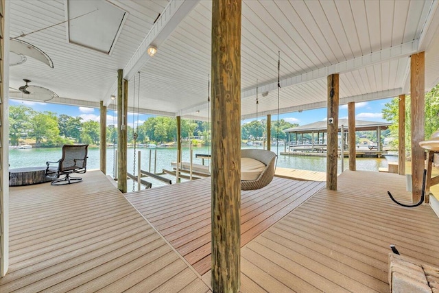 dock area with a water view