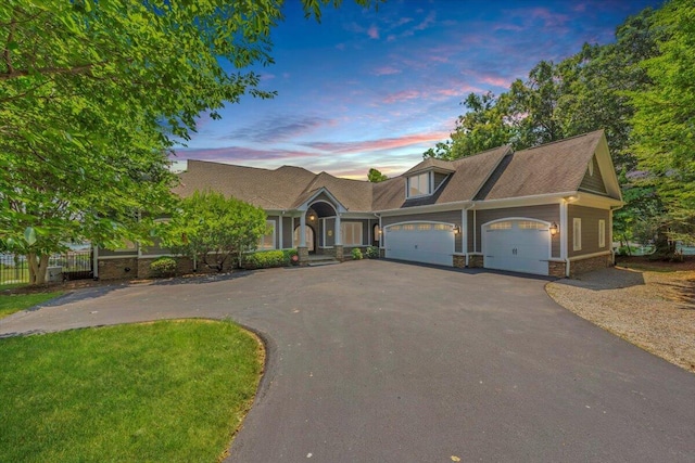 view of front of property with a garage