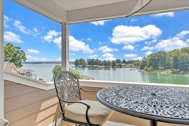 balcony featuring a water view