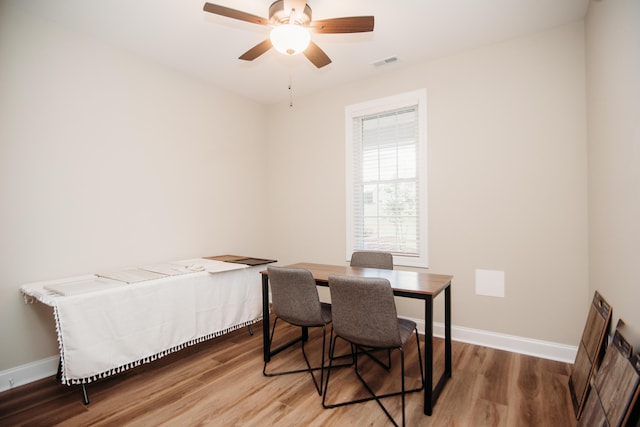 bedroom with ceiling fan and hardwood / wood-style floors