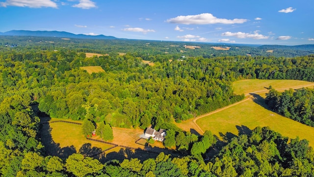 bird's eye view featuring a mountain view and a forest view