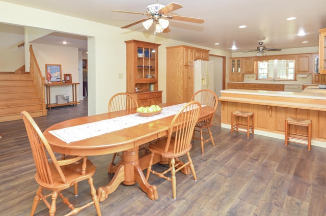 dining space with recessed lighting, dark wood-style flooring, ceiling fan, and stairs