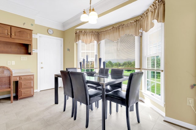 dining space featuring light tile patterned floors, crown molding, and an inviting chandelier