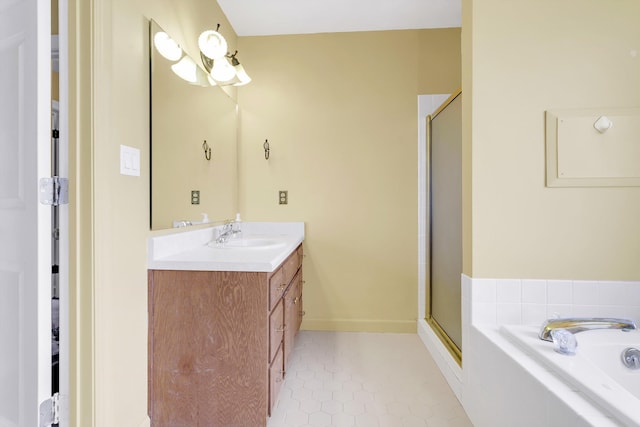 bathroom featuring separate shower and tub, tile patterned floors, and vanity