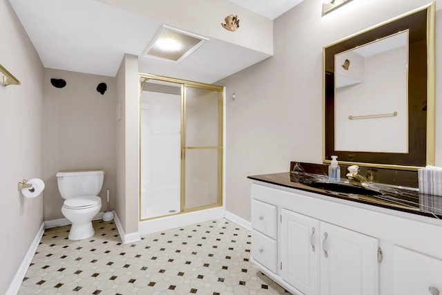 bathroom featuring a shower with door, toilet, tile patterned floors, and vanity