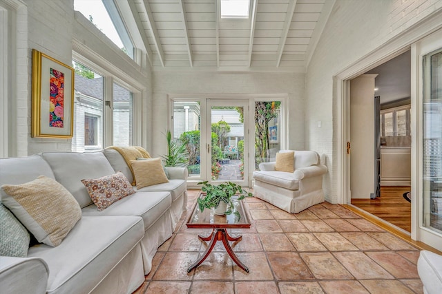 sunroom with wood ceiling, lofted ceiling with beams, and a healthy amount of sunlight