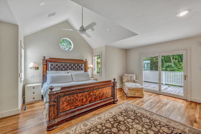 bedroom featuring ceiling fan, vaulted ceiling, access to exterior, and light hardwood / wood-style flooring