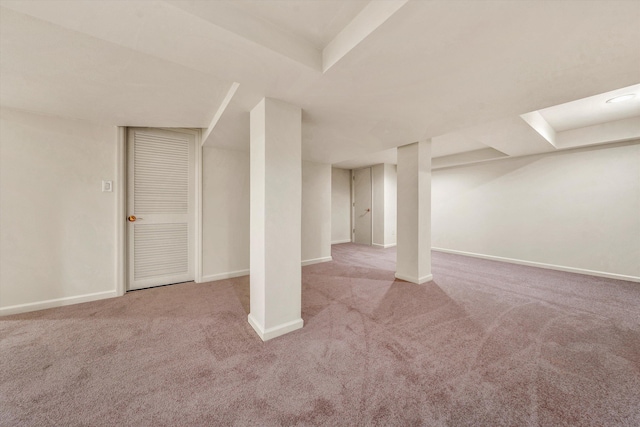 basement with light colored carpet