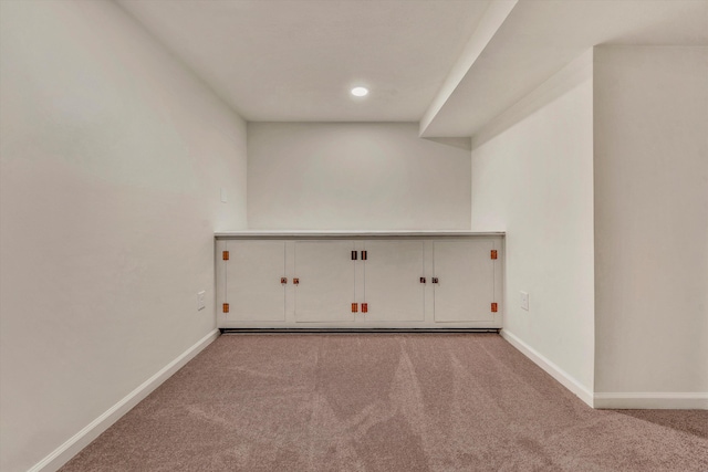 empty room featuring light carpet