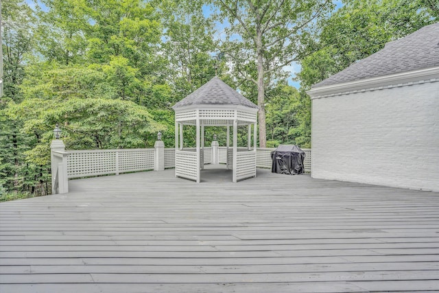 deck featuring a gazebo and area for grilling