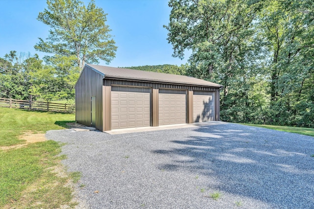 detached garage with fence