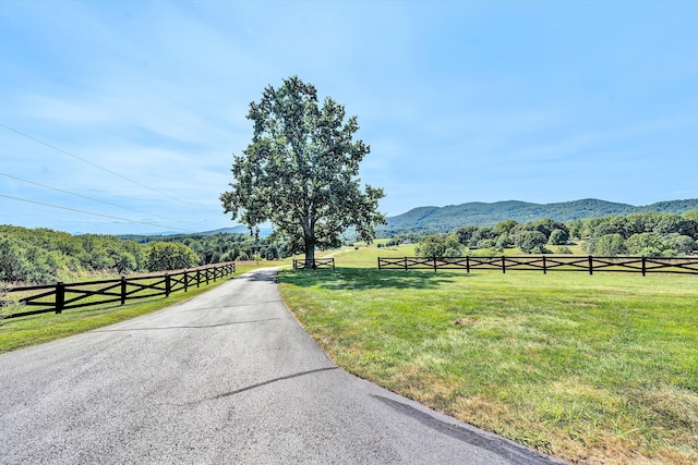 view of road with a mountain view and a rural view