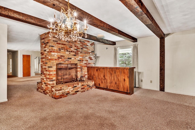 unfurnished living room featuring a brick fireplace, carpet flooring, an inviting chandelier, and beam ceiling