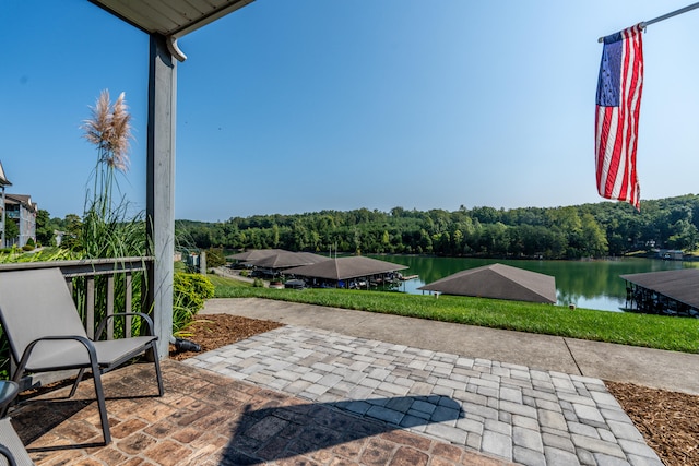 view of patio / terrace with a water view