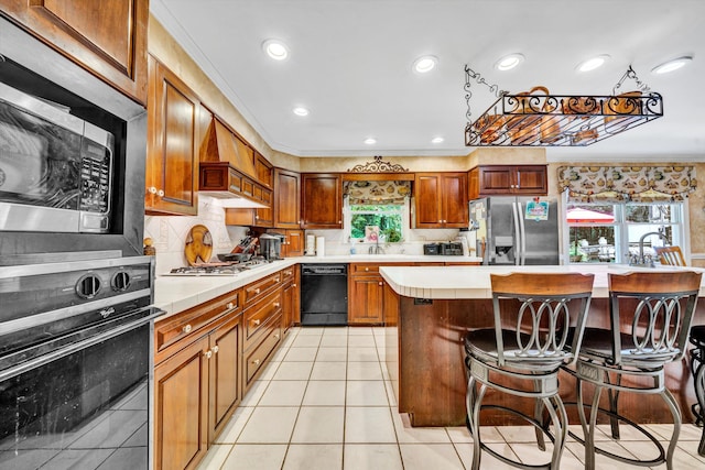 kitchen featuring appliances with stainless steel finishes, light tile patterned floors, premium range hood, and tasteful backsplash