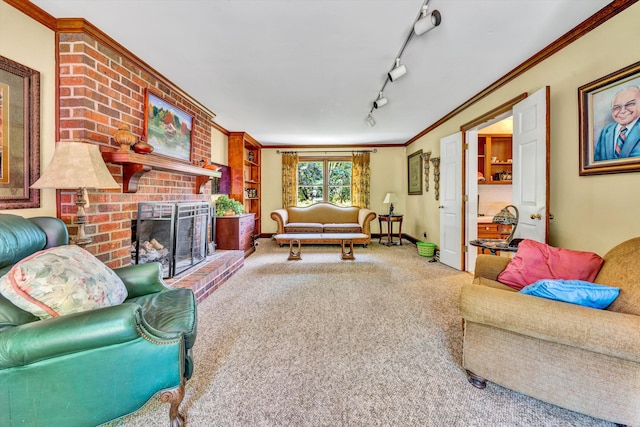 carpeted living room featuring track lighting, crown molding, and a brick fireplace