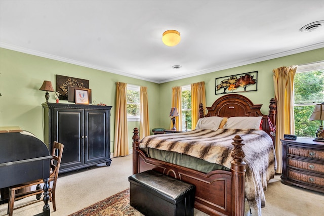 bedroom featuring multiple windows, light carpet, and ornamental molding