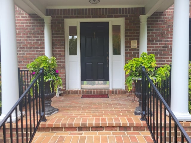 doorway to property with a porch