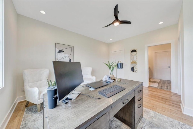 office area featuring light wood finished floors, recessed lighting, baseboards, and ceiling fan