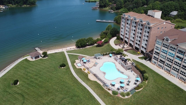 birds eye view of property with a water view