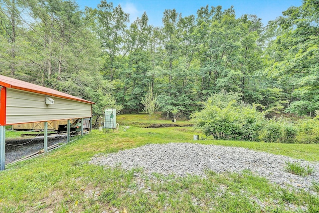 view of yard with a carport