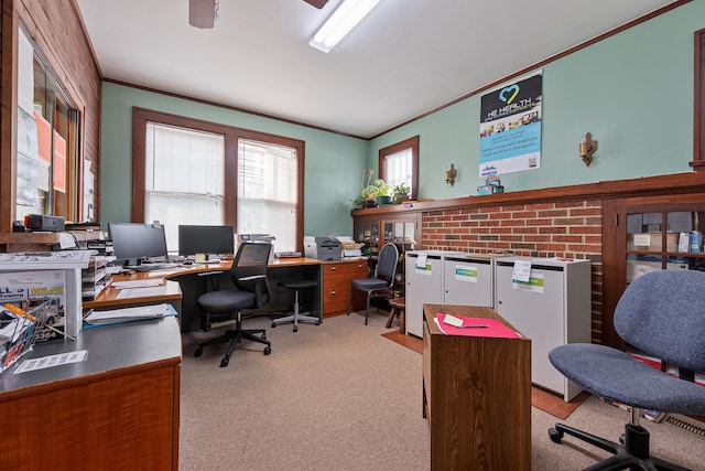 office space featuring ornamental molding, light carpet, and ceiling fan