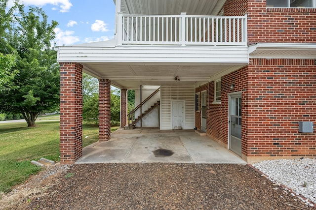 view of parking with a yard