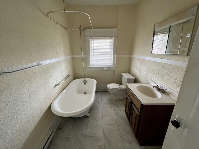 bathroom with vanity, tile patterned flooring, and toilet