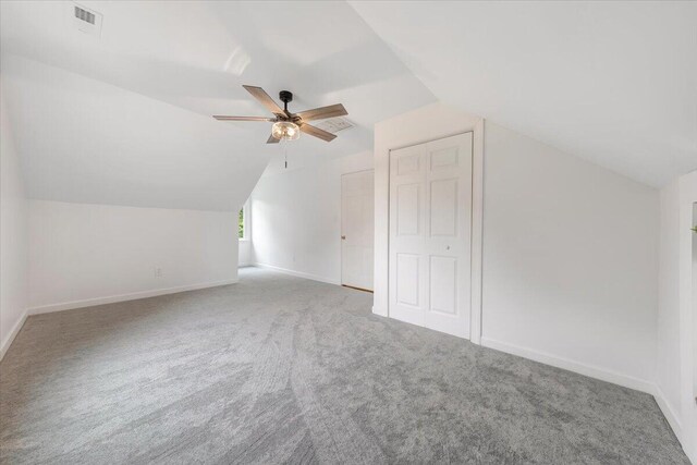 bonus room featuring carpet, vaulted ceiling, and ceiling fan