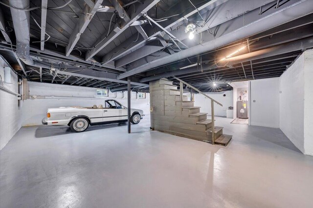 basement featuring water heater