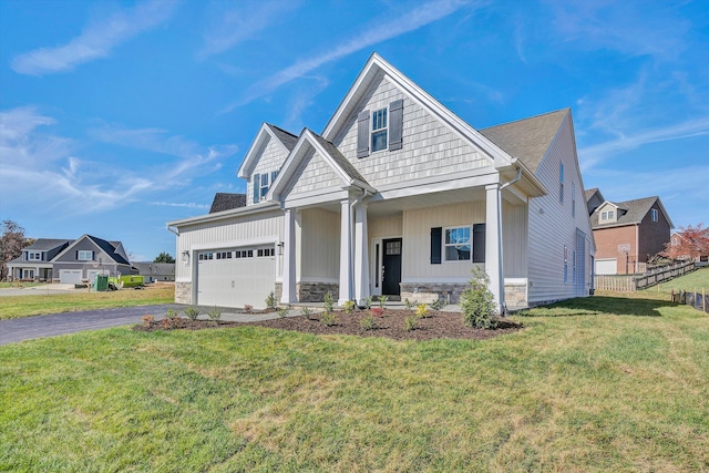 craftsman inspired home with a front lawn