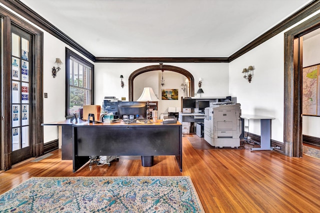 office with hardwood / wood-style flooring and ornamental molding