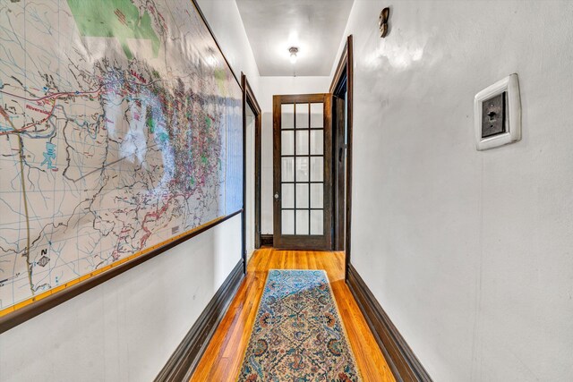 corridor featuring light wood-type flooring