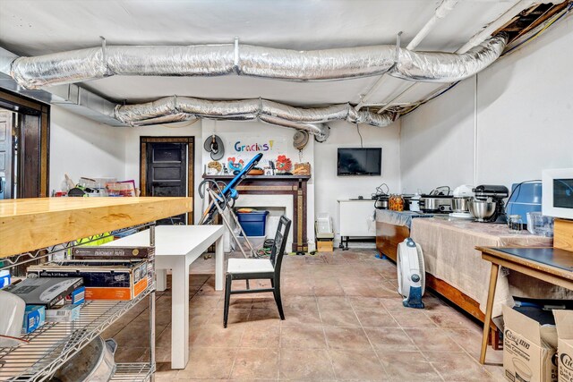 basement with light tile patterned floors