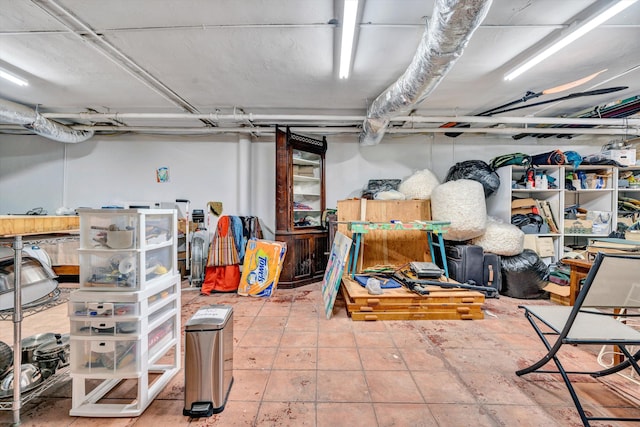 basement with tile patterned floors