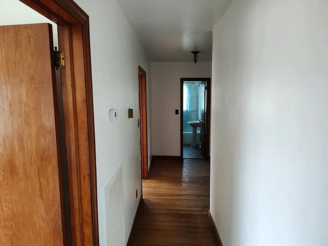 hall featuring dark hardwood / wood-style floors