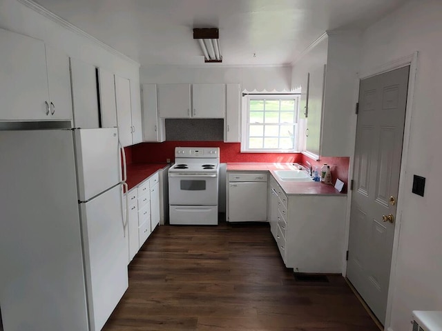 kitchen featuring tasteful backsplash, white appliances, white cabinets, sink, and dark wood-type flooring